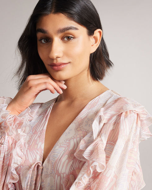IRVETE-Trousers-Ideal for sunny walks along the river or enjoying a pub lunch, IRVETE is as easy to throw on as it is captivating. Finished with ruffles, this romper is a must-have for your summer wardrobe. Ted Baker womenswear collection Romper Soft ruffle detail Fully lined Our model is 5'9" / 1.75m and wears a Ted size 1- Ted Baker Romania